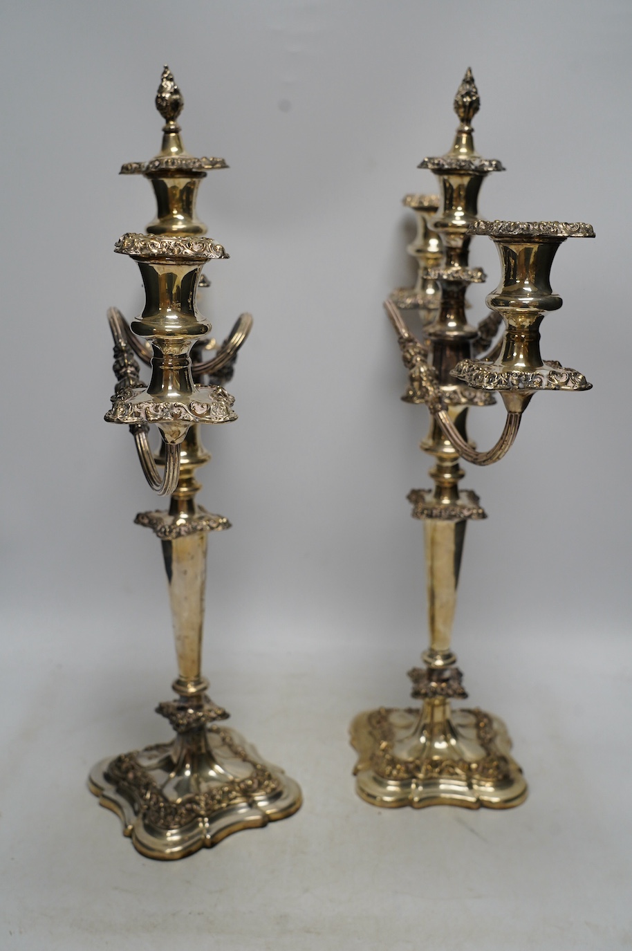 A pair of EPNS candelabra, 52cm high. Condition - fair to good